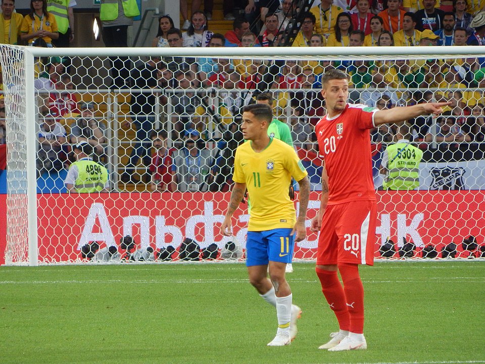 Serbia's Sergej Milinkovic-Savic and Brazil's Philippe Coutinho | Image Courtesy: By Oleg Bkhambri (Voltmetro)